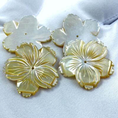 Buy yellow mother of pearl beads for DIY jewelry making. Hand carved from natural and organic natural mother of pearl shells. Wholesale pricing.